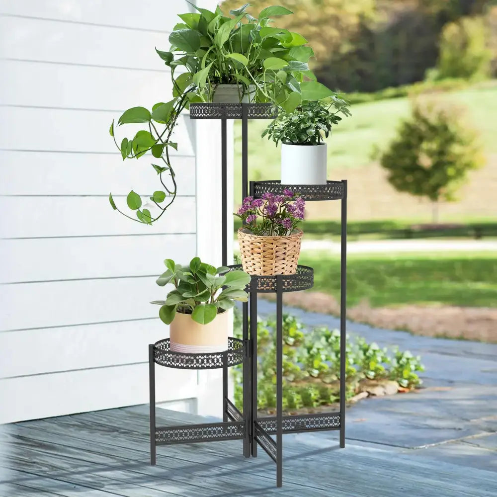 Decorbites metal plant stand black wrought iron three-tier lattice pattern holding white pots for living room use