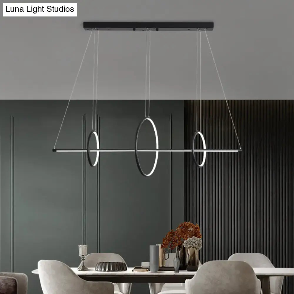Modern black and white circular pendant light fixture with sleek metallic rods for 220v-240v use, ideal for island lighting