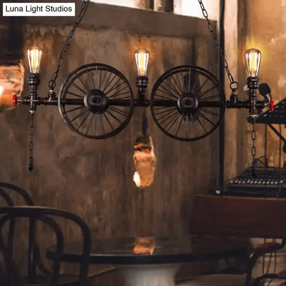 Industrial-style black metallic pendant light with three vintage edison bulbs and antique wagon wheel design 220v-240v