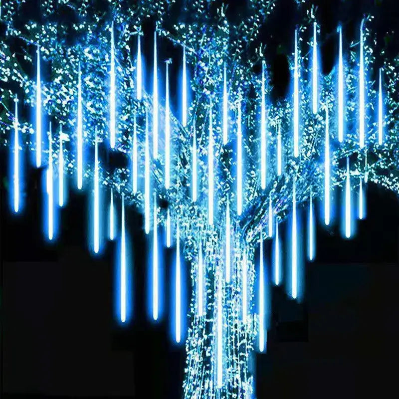 DecorBites meteor shower blue led string lights hanging from a tree for outdoor decor