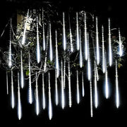 Decorbites™ meteor shower led string lights with white led raindrop bulbs hanging from outdoor branches
