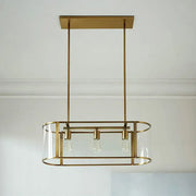 Decorbites mid century gold pendant light with translucent glass oval cage and three exposed bulbs suspended fixture