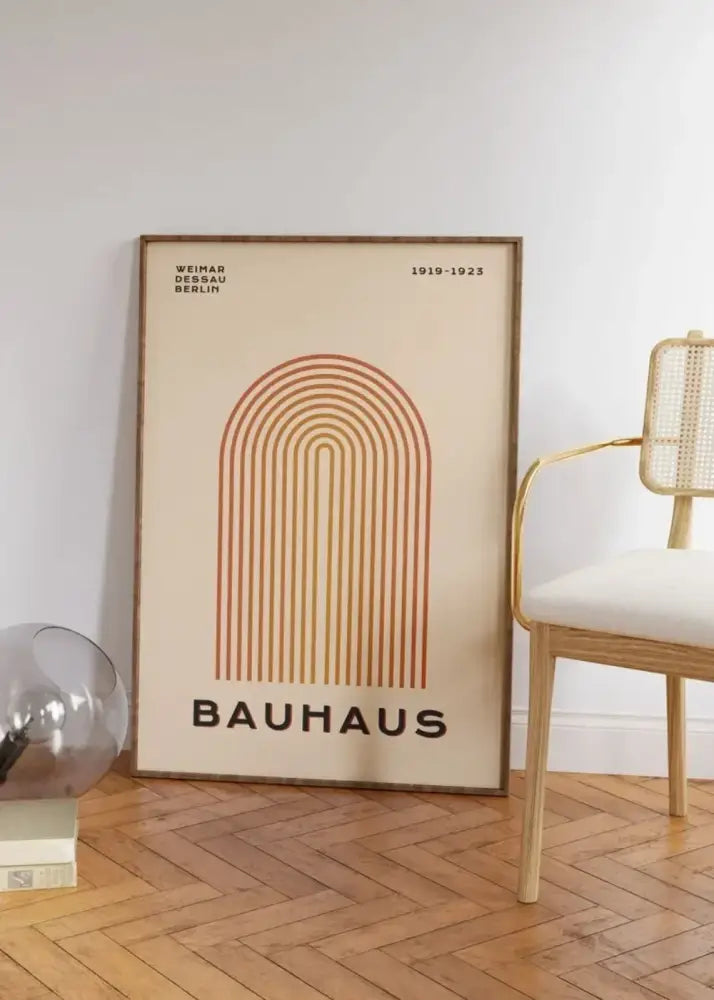 Beige framed bauhaus poster with warm orange geometric arch design mid century modern wall art by decorbites