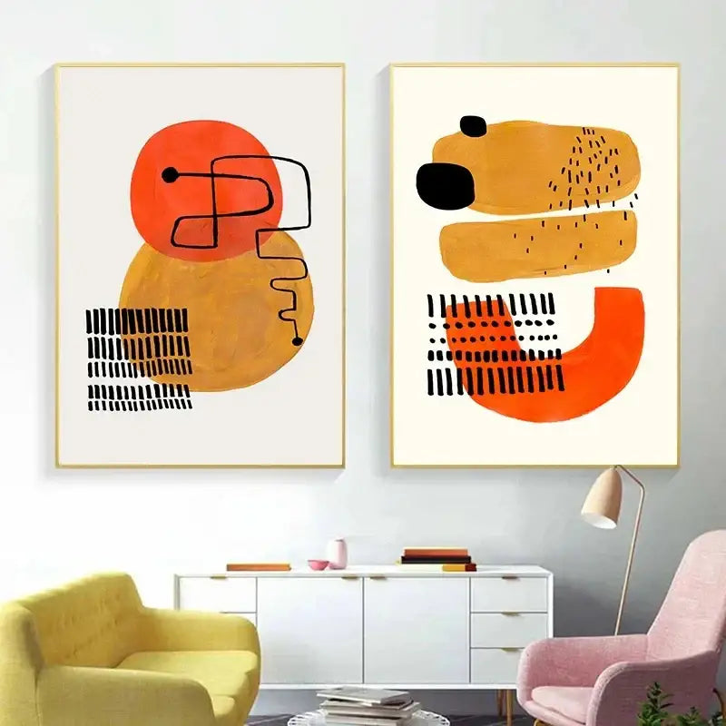Two framed DecorBites™ mid century canvas prints featuring bold orange and mustard watercolor brush strokes