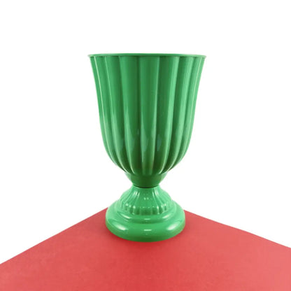 DecorBites mini flower arrangement vase is a glossy green fluted ceramic urn with a decorative ridged base for home decor