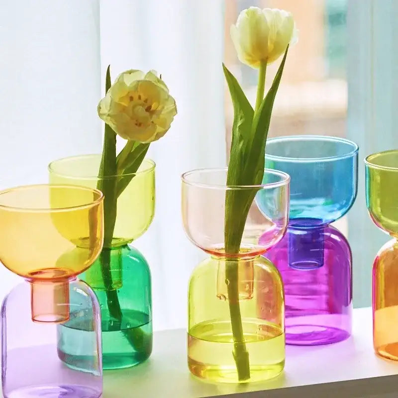 Decorbites mini glass vase set featuring colorful translucent glass vases with a two-part design for plants and candles