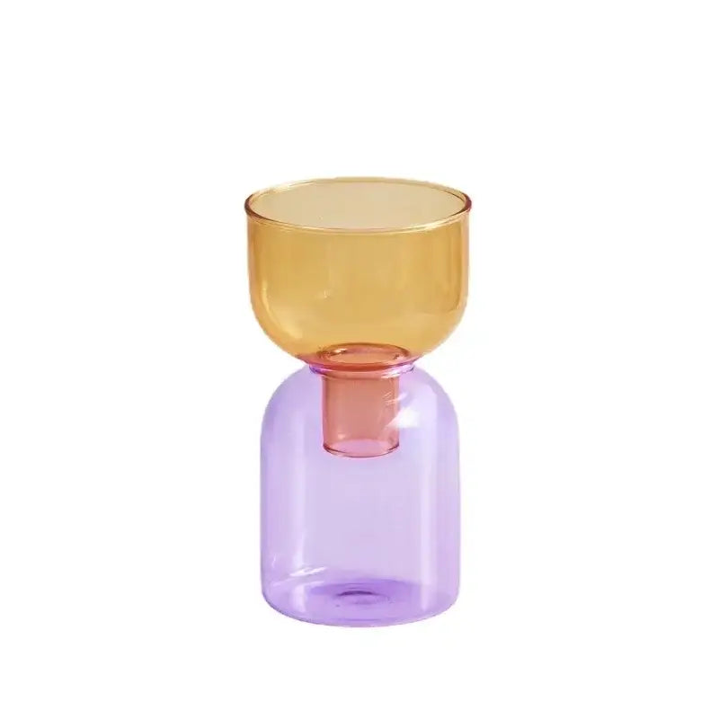 A translucent amber glass vase with lavender base and pink neck from decorbites mini glass vase set for plants and candles