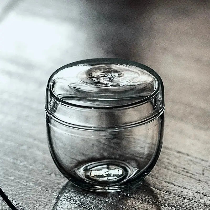 DecorBites™ mini moss glass vase terrarium with clear glass jar and concentric circular patterns on lid and surface