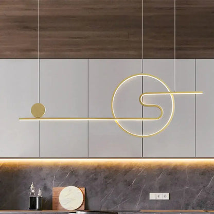 Modern gold-toned decorbites™ acrylic linear led island light with warm white light in black white gold finish and sun cloud design