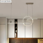 DecorBites™ minimal acrylic linear island light in black white gold with warm white light and sun and cloud design