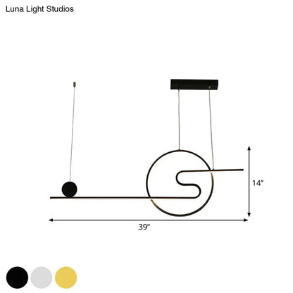 Modern black minimalist pendant island light with warm white light and abstract s-shaped design in black white gold finish