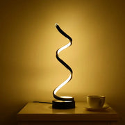 DecorBites™ minimalist acrylic curve black LED desk lamp with glowing spiral band for warm living room lighting