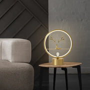 Gold-toned minimalist brass halo ring table light with deer decoration featuring led and metal fixture width design