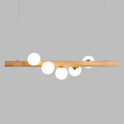 DecorBites minimalist cream glass LED ball island pendant light with natural wood bar and five frosted globe bulbs