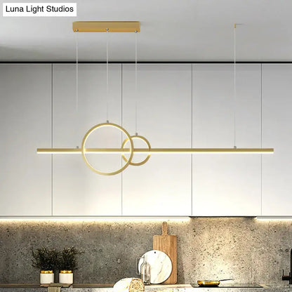 DecorBites™ minimalist gold-toned ceiling light with intersecting rings and warm third gear for kitchen island use
