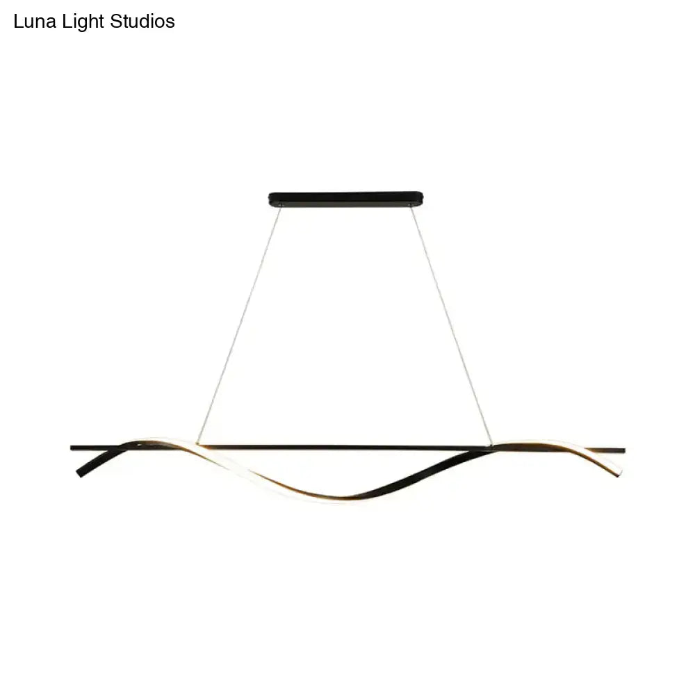 Modern black and gold led minimalist hanging island light with sleek flowing design for dining room by DecorBites