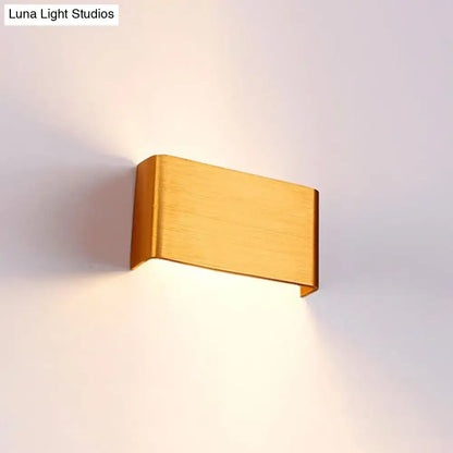 Gold-finished rectangular wall lamp with sleek modern design for living room warm white lighting
