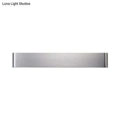 Minimalist black and silver led wall lamp with sleek stainless steel money clip design for living room warm white light