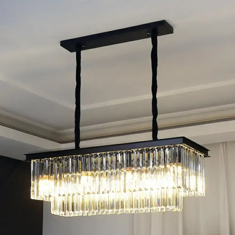 Black rectangular DecorBites pendant light with cascading clear prismatic crystal prisms for minimalist restaurant decor