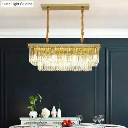 Decorbites minimalist prismatic crystal pendant light with gold-toned rectangular frame and cascading crystal prisms
