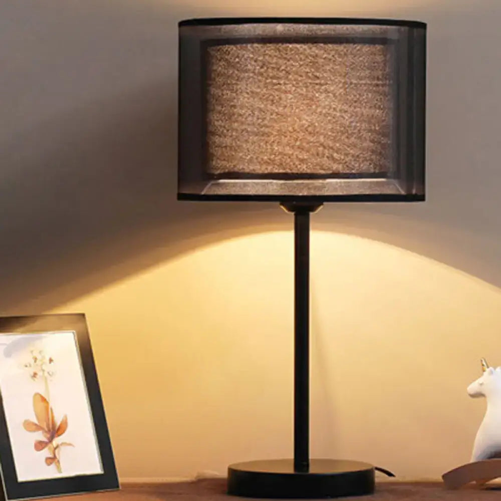 Decorbites minimalist black rectangular table lamp with beige fabric drum shade and sleek metal bulb base for living room