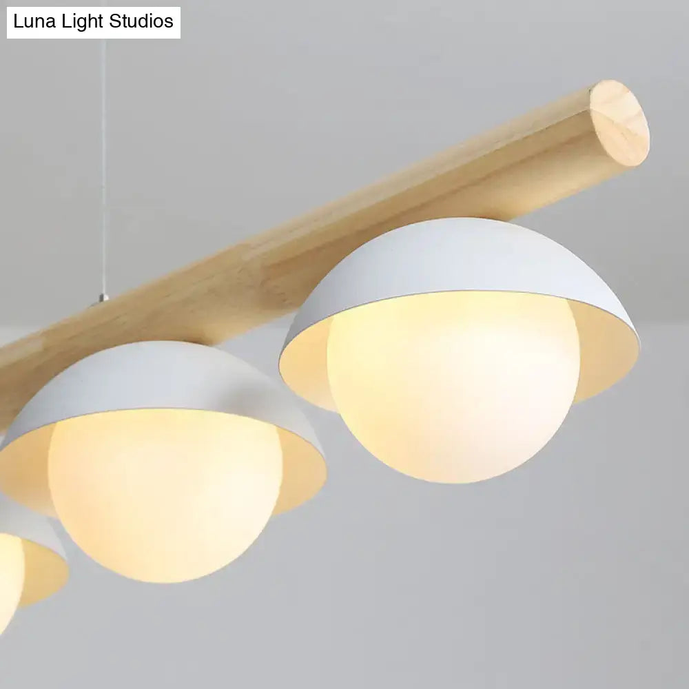 DecorBites minimalist grey wood island pendant with white matte dome shades and warm diffused glow for kitchens