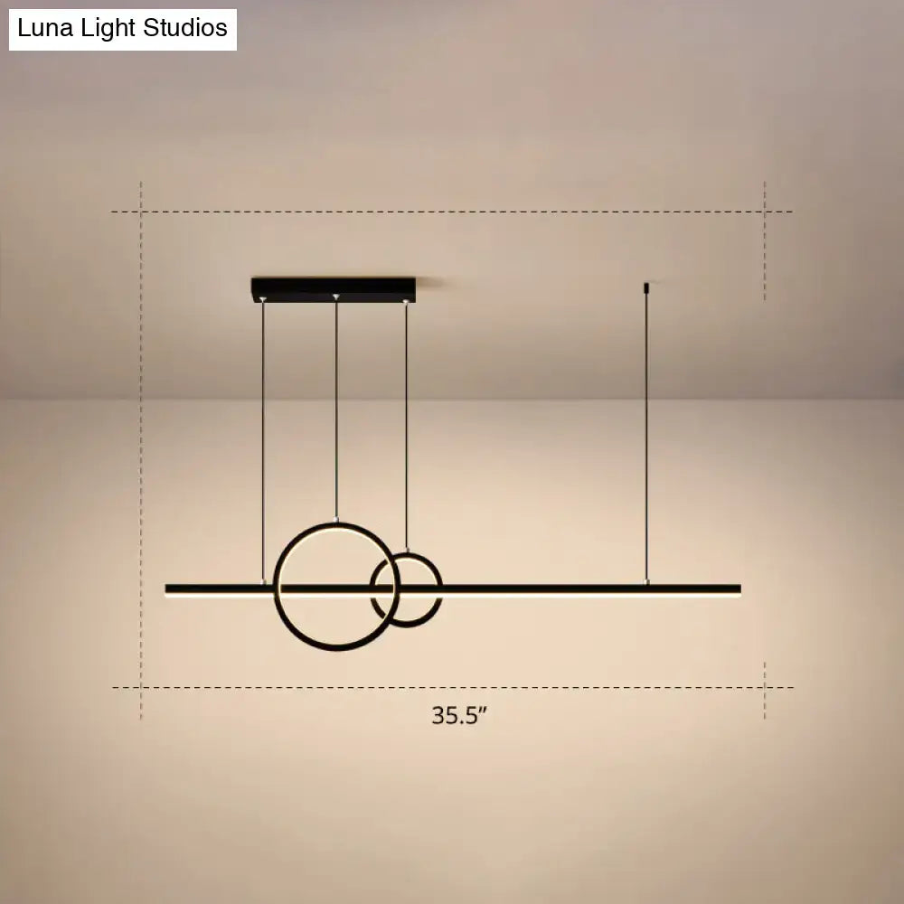 Black minimalist acrylic LED ceiling light with sleek circular rings and horizontal bar for modern dining rooms