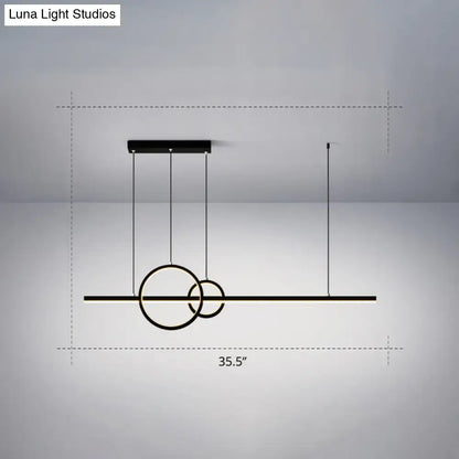Modern black and gold acrylic ceiling light with minimalist circular pendant design for dining room decorbites suspension