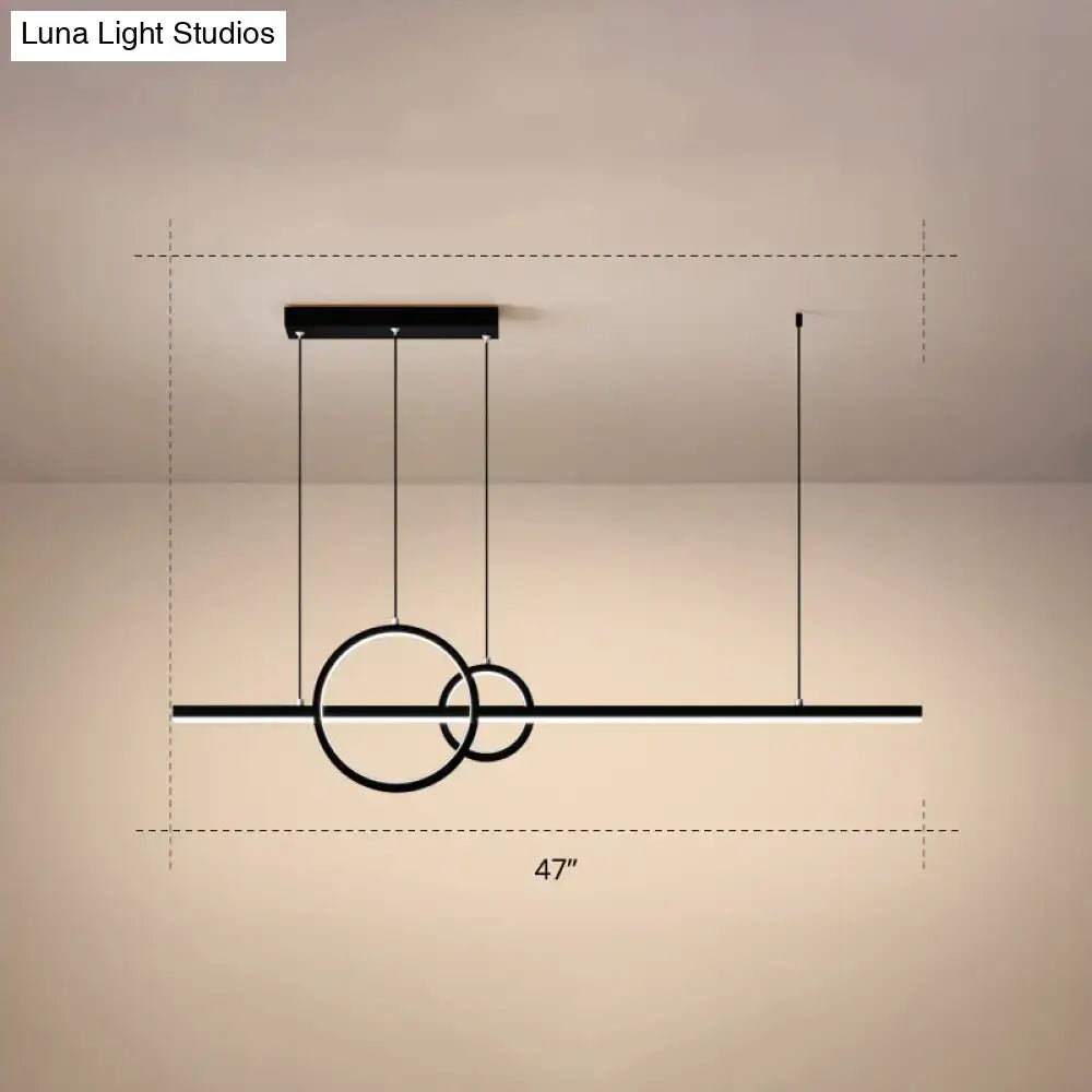 Modern black minimalist acrylic ceiling light with intersecting rings and horizontal bar for dining room by luna light studios