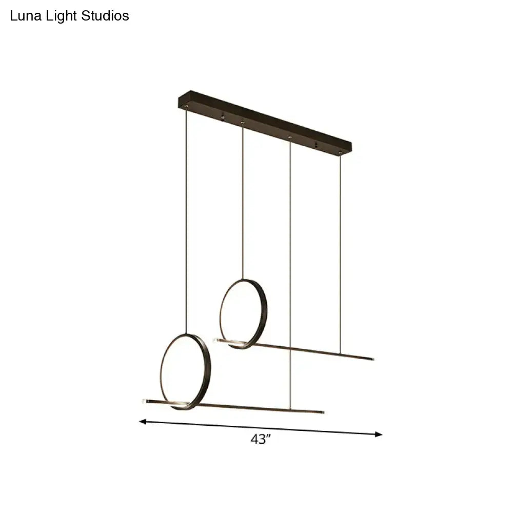 Modern black finish light fixture featuring minimalistic iron design with circular and linear LED elements suspended