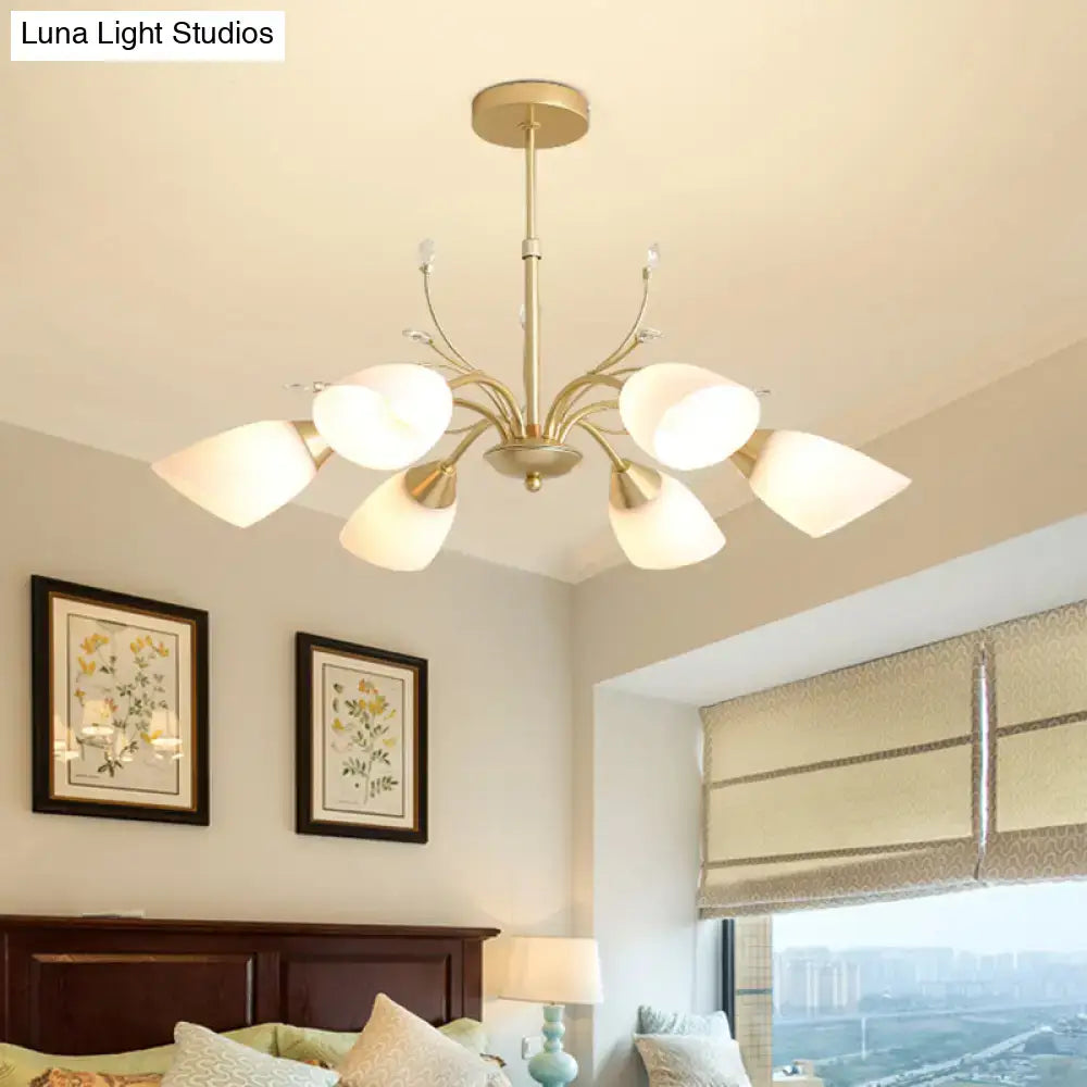 DecorBites™ modern gold hanging chandelier with six frosted white glass shades and a central metallic stem