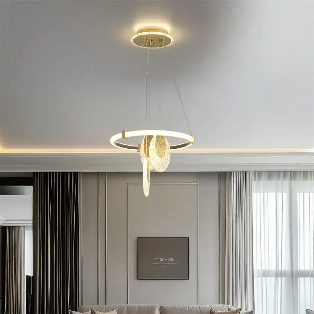DecorBites™ modern gold-toned 3-layer LED chandelier pendant light with glowing circular LED rings and acrylic accents