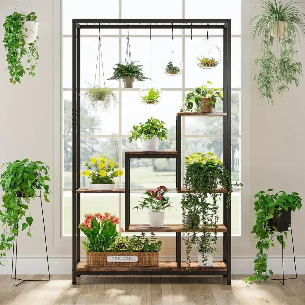 DecorBites™ modern 5-tier tall black metal and wood plant stand with multiple shelves holding various potted plants