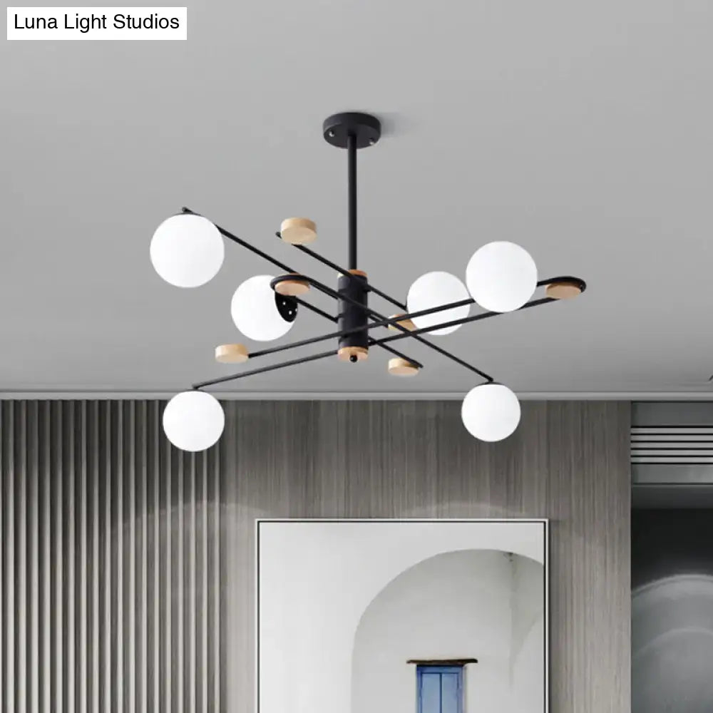 DecorBites™ modern black metal chandelier with six frosted glass shades and wooden accents for living room lighting
