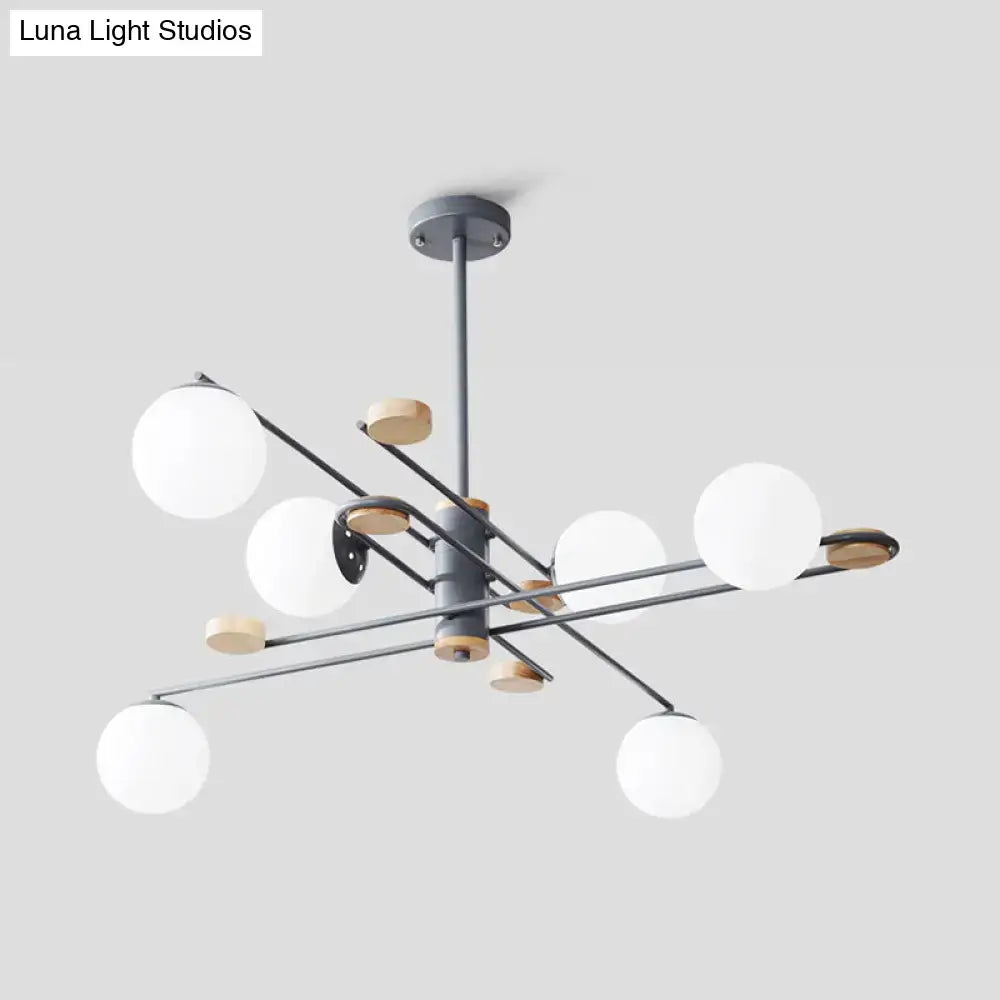 DecorBites modern 6-head black grey chandelier with matte metal arms, wood accents, and frosted glass shades for living room