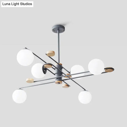 DecorBites modern 6-head black grey chandelier with matte metal arms, wood accents, and frosted glass shades for living room