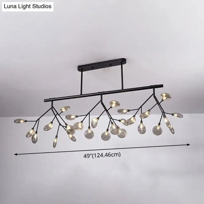 Black metal firefly island pendant chandelier with branching arms and clear glass globe bulbs for dining room lighting