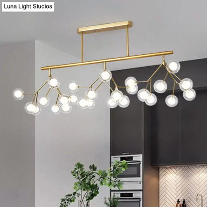 Gold-toned DecorBites™ modern acrylic firefly island pendant ceiling light with clear glass globe bulbs in branching design