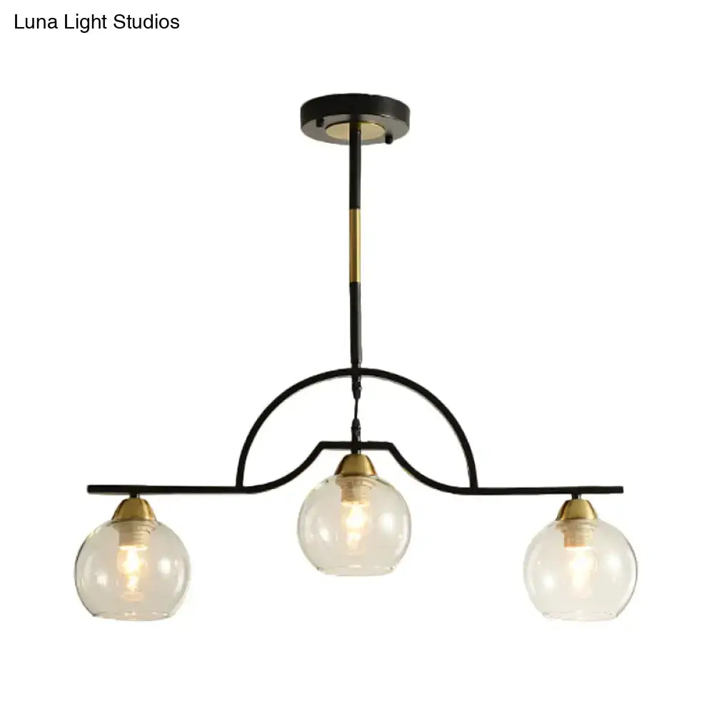 DecorBites modern arched island pendant light with black and brass finish and clear white glass globe bulbs