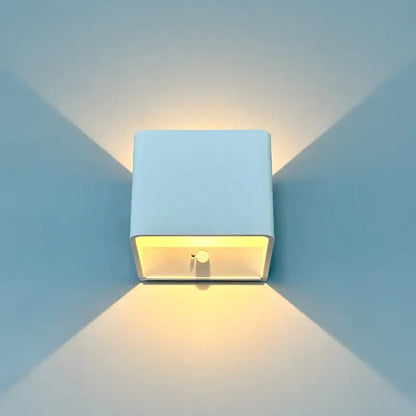 Decorbites™ modern battery operated white square wall sconce with warm yellow light from open front battery operated wall