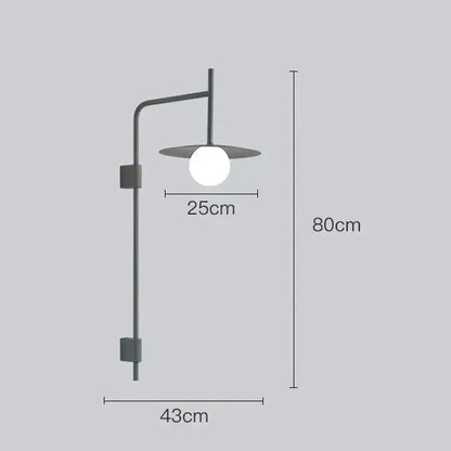 Decorbites™ modern bedside wall light with matte black metal arm and spherical white glass bulb in flat circular shade