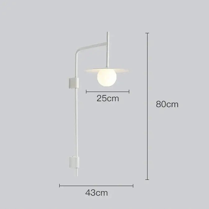 Minimalist white DecorBites™ modern bedside wall light with a sleek curved arm and spherical glass shade