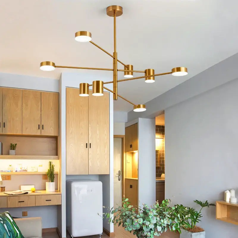 Decorbites modern black chandelier with gold-toned cylindrical lights branching from a central rod for nordic style home lighting
