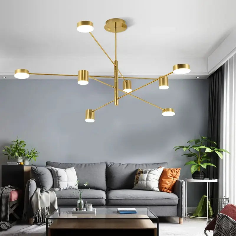 DecorBites modern black chandelier with gold-toned cylindrical lights in nordic style home lighting design