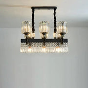 DecorBites modern black metal island pendant lamp with three clear glass candle shades and crystal prism fringe fixture width