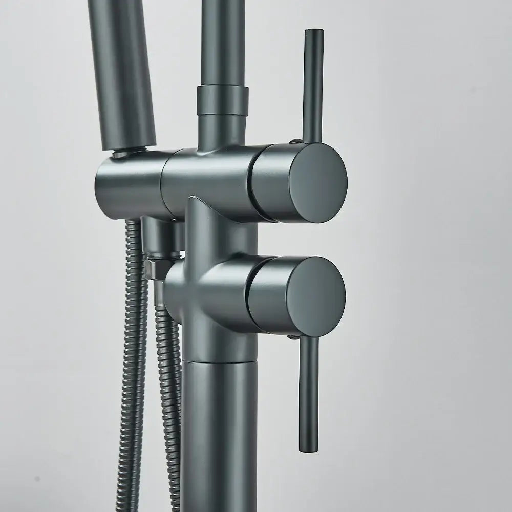 DecorBites™ modern black floor mounted tub faucet with matte finish, sleek cylindrical handles, and flexible hand shower
