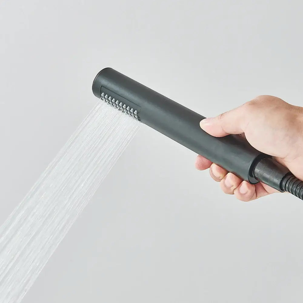 DecorBites™ modern black floor mounted tub faucet with black matte hand shower featuring sleek cylindrical design