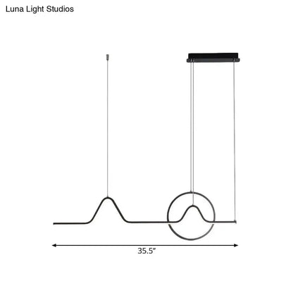 Modern black metal pendant ceiling light with sleek wave design and circular accent featuring warm white light