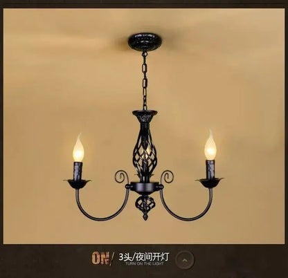 DecorBites™ modern black iron chandelier with three candle-style lights for living room use