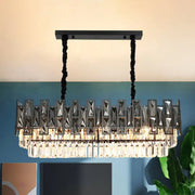 Decorbites modern black island pendant lamp with smoke faceted crystal prism layers and black metal frame hanging chains